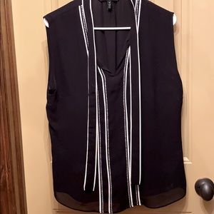 Sleeveless black blouse